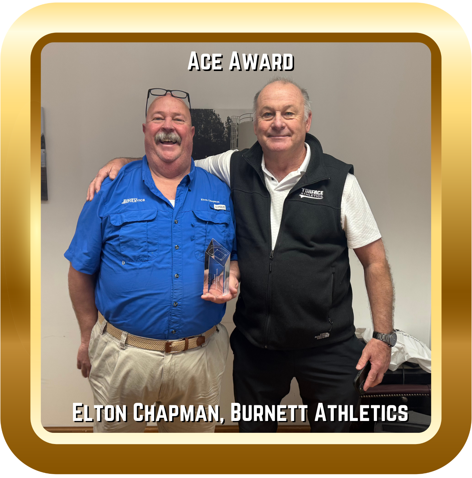 Image of two men with an Ace Award.