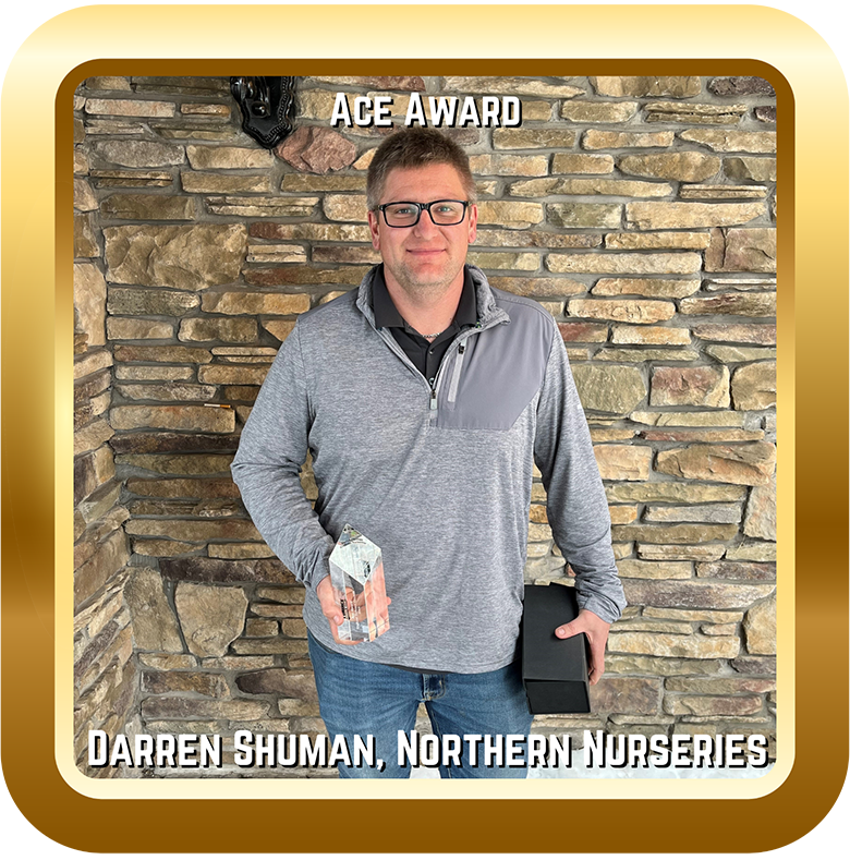 Image of a man with an Ace Award.