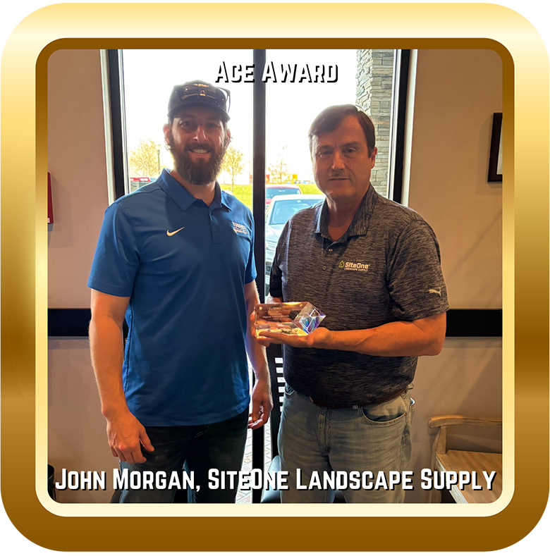 Image of two men with an Ace Award.