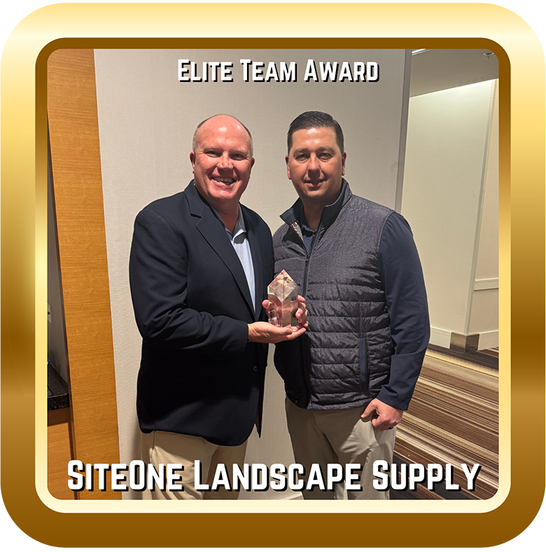 Image of two men with an Elite Team Award.
