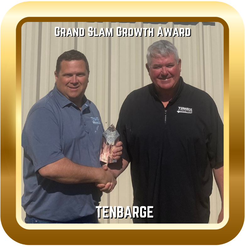 Image of two men with a Grand Slam Growth Award.