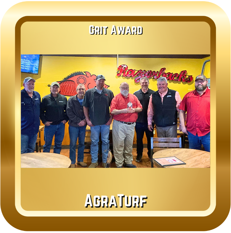 Image of a team of men with a Grit Award.
