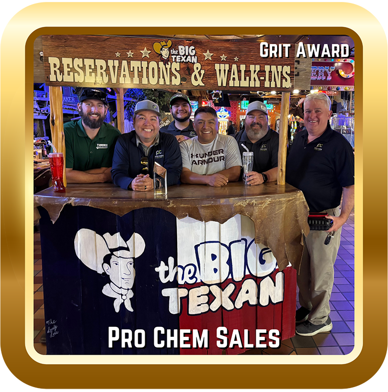Image of a team of men with a Grit Award.
