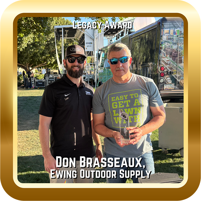 Image of two men with a Legacy Award.